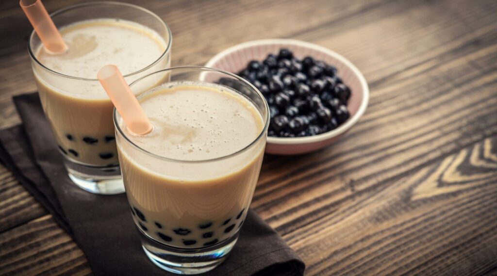 fresh tapioca pearls and Japanese milk tea in a glass