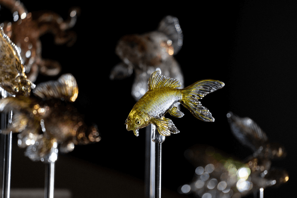 A highly detailed lollipop depicting a goldfish.
