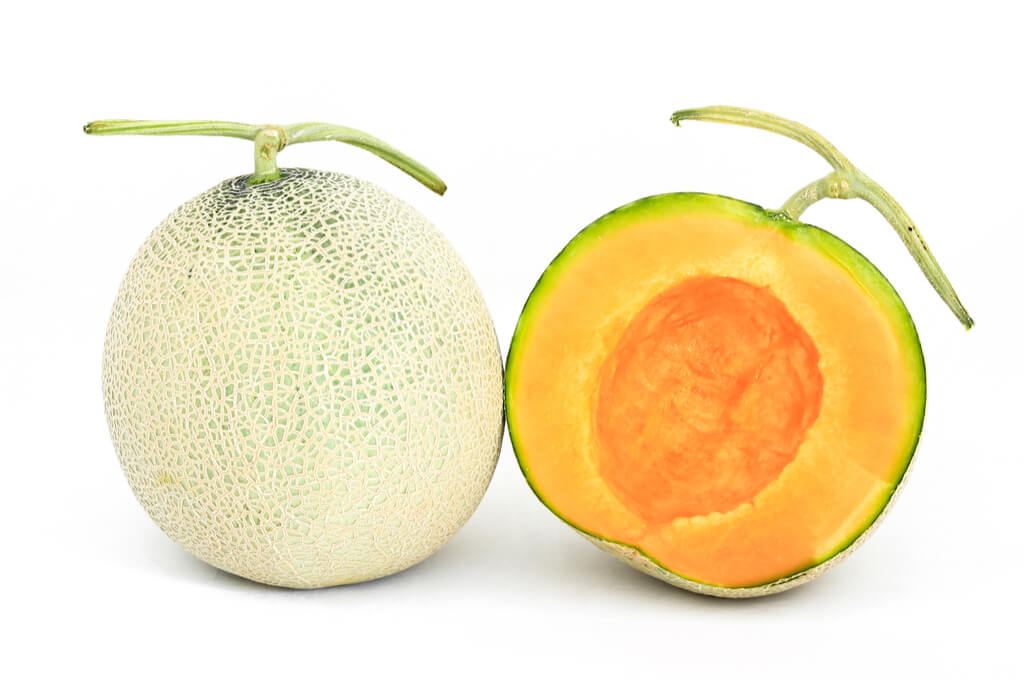 A bright orange Yubari melon from Hokkaido. 