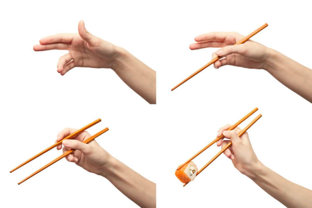 A guide to holding chopsticks with a hand in four different positions, going from holding nothing to holding two chopsticks and a salmon roll