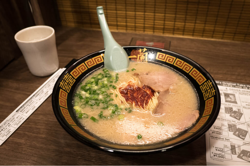 A bowl of ramen from Ichiran, a popular ramen shop originally from Kyushu's Fukuoka, with the signature red chili paste in the center