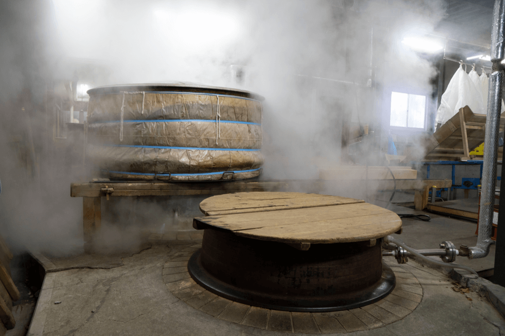 Large steamers in a Japanese sake distillery used to make sake rice for the fermentation process.