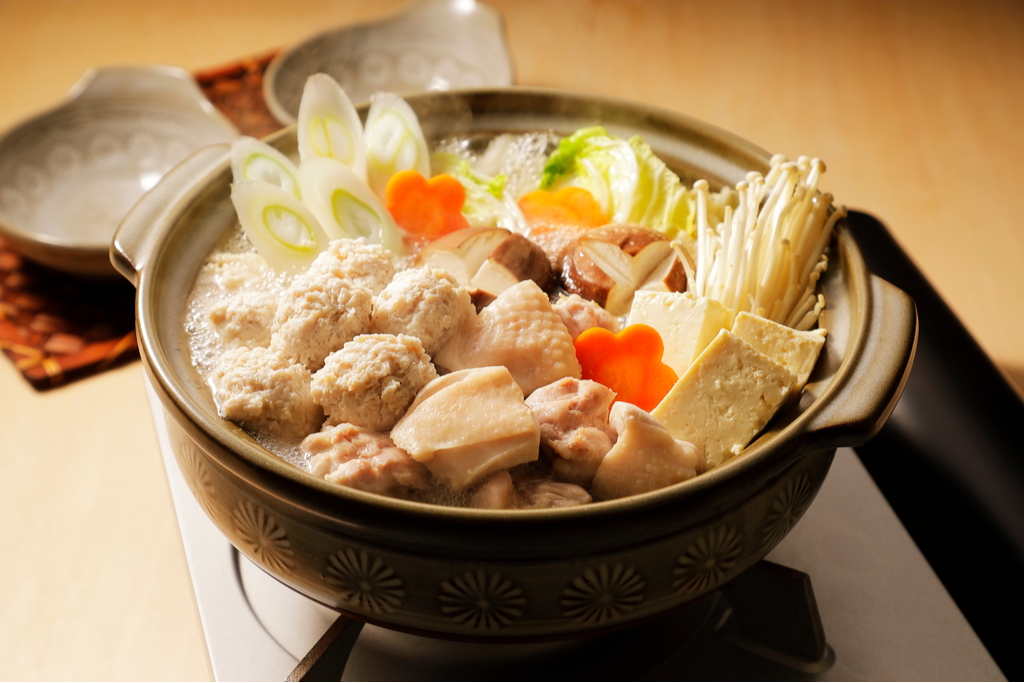 A bowl of chanko nabe, which uses a lot of chicken meat and other forms of protein.