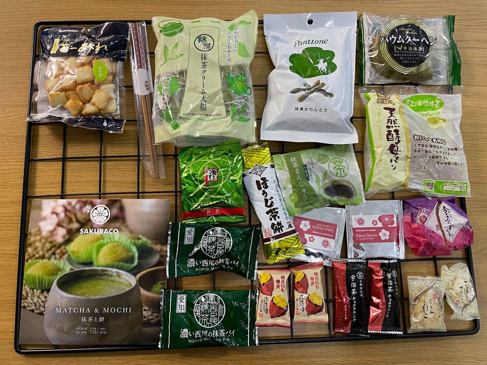 Bokksu box items placed on a board to show the quantity and quality of the products.