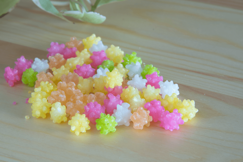 A photograph of kompeito a bright, colorful candy that resembles litlle fireworks.
