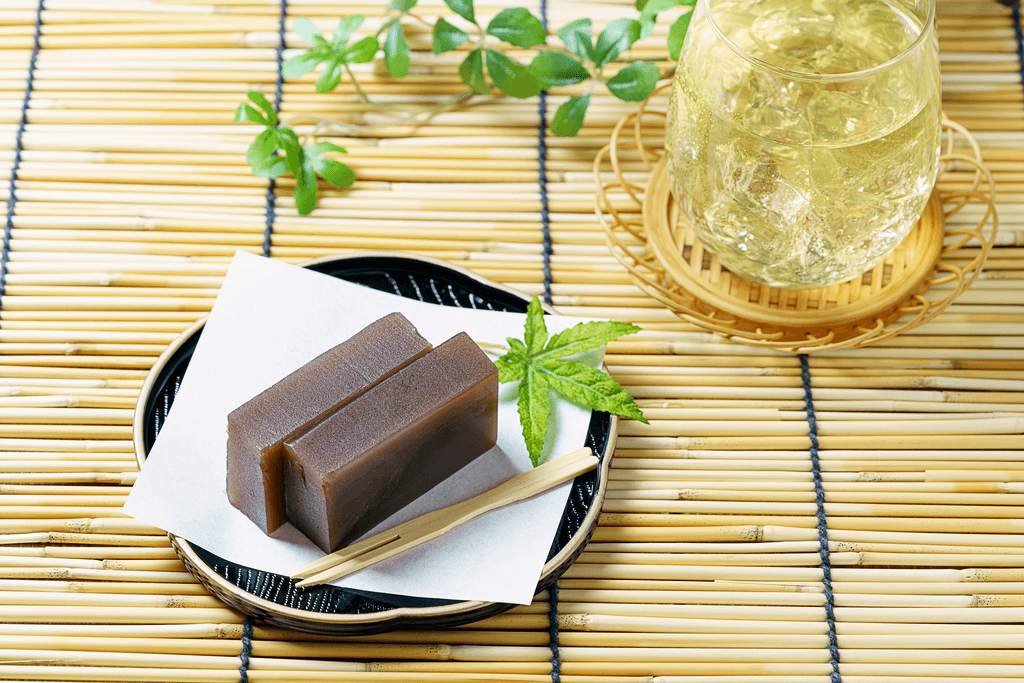 A photograph of yokan, which is a rectangular, tradtional Kyoto sweet made of red bean paste and kudzu powder.