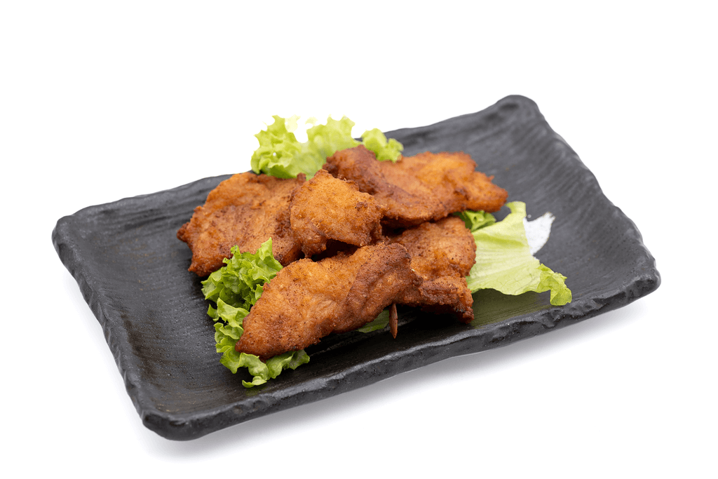 A plate of Nakatsu-style fried chicken, which is flatter and more lightly battered.