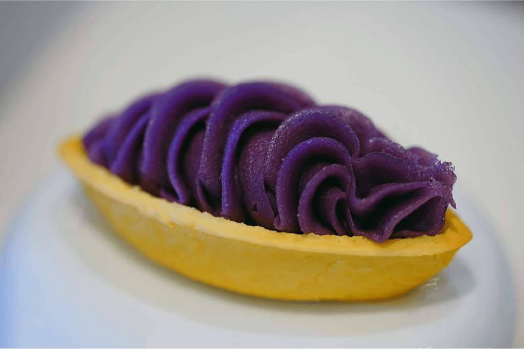 A beni-imo tart, which has a light yellow crust, and a bold purple filling.