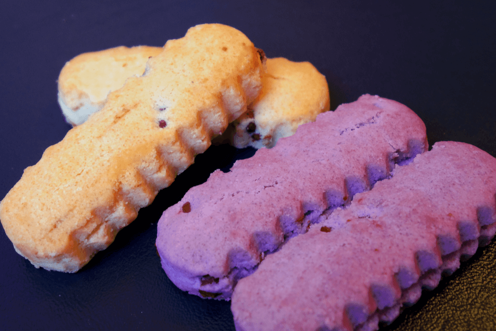 A bunch of chinsuko cookies both vanilla and purple sweet potatoes.