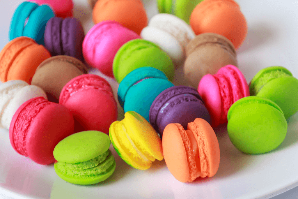 A photograph of macarons, which a round, usually colorful soft cookie made of butter, sugar and almond paste.