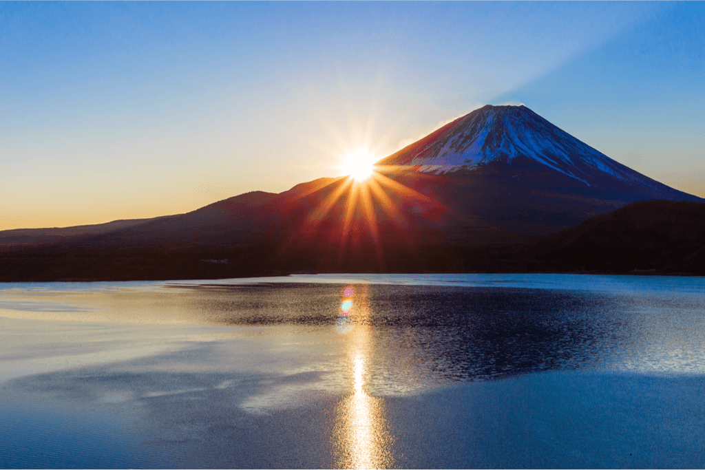 A beautiful hatsuhinode sunrise over a mountain in Japan.