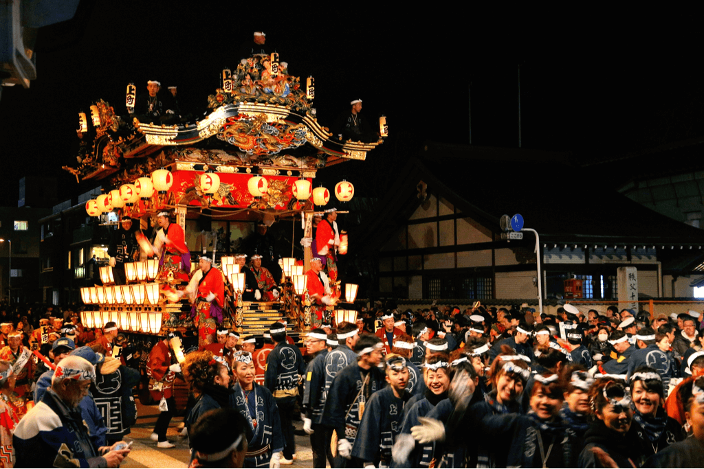An elaborate shrine of red and gold at night at the Chichibu Night Festival. This is one of many Japanese winter festivals.
