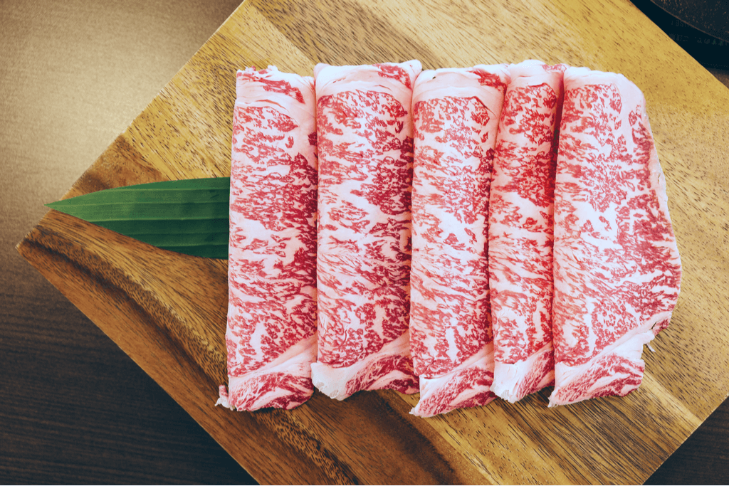 A close up of the marbling on Wagyu beef steak. Note how much fat is in it.