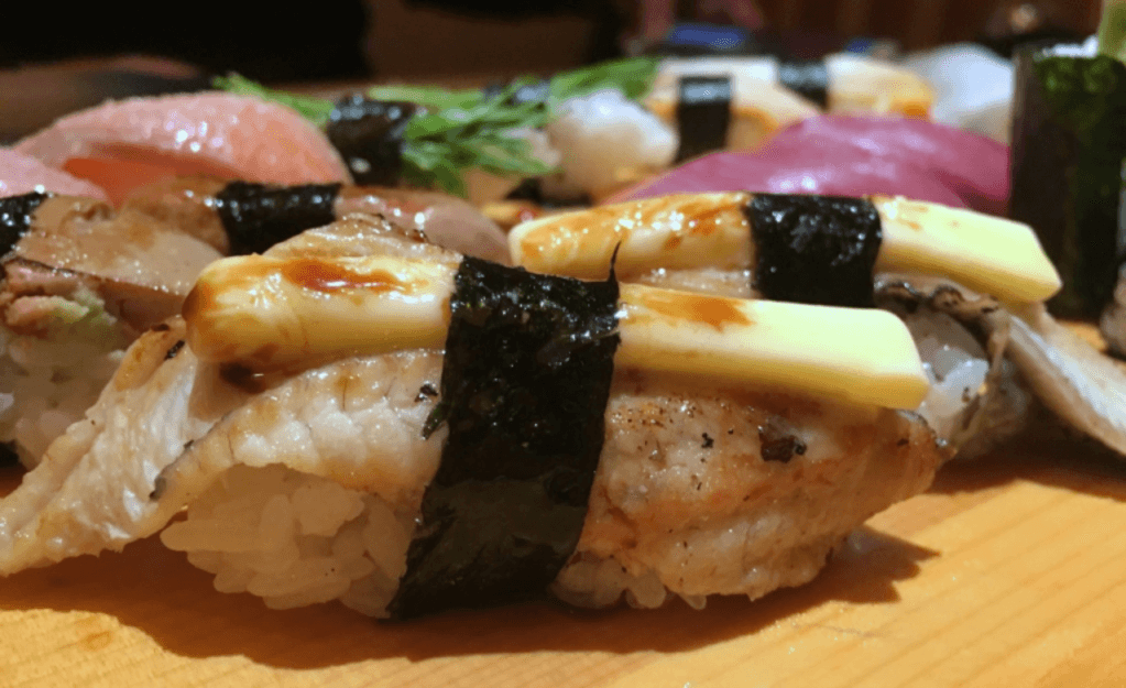 A plate of butter eel sushi.