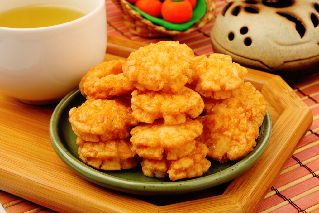 A plate of kabuki age, a type of deep fried Japanese rice snacks.