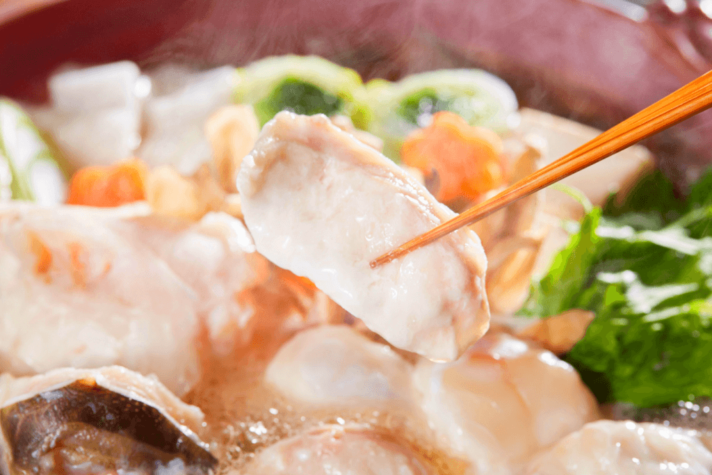 A hotpot of fugu blowfish meat.