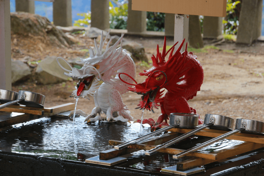 Two dragons near the found at Izusan Shrine. What is a temple of love?