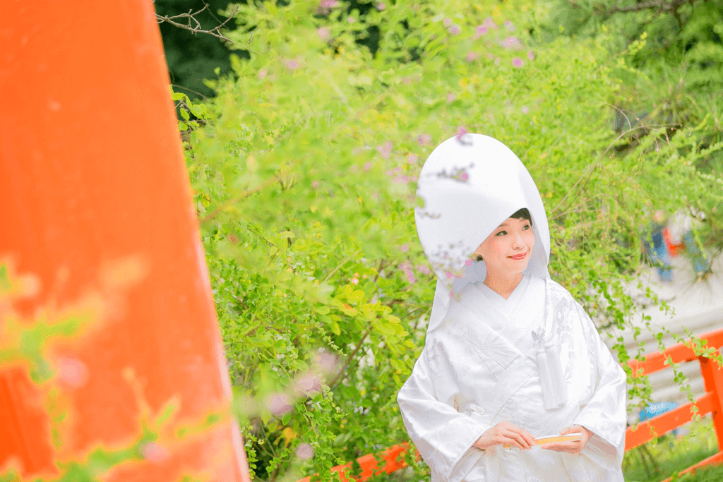 A Japanese bride wearing a womens kimono shiromuku.