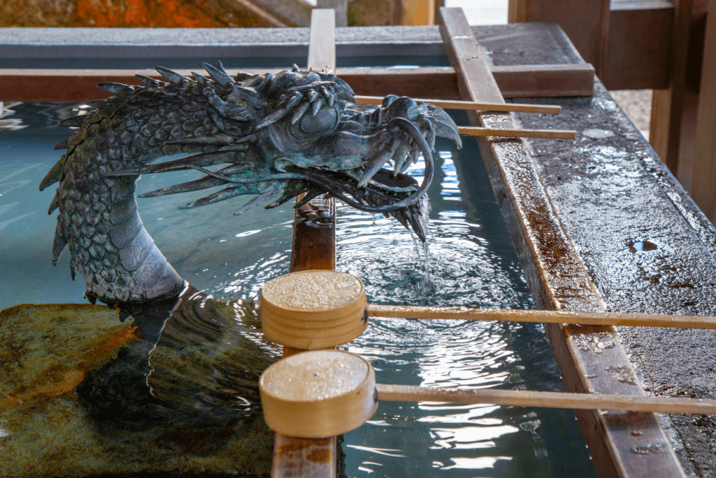 The suijin is one of many mythical creatures of Japan. This is a stone statue near a Shinto shrine.