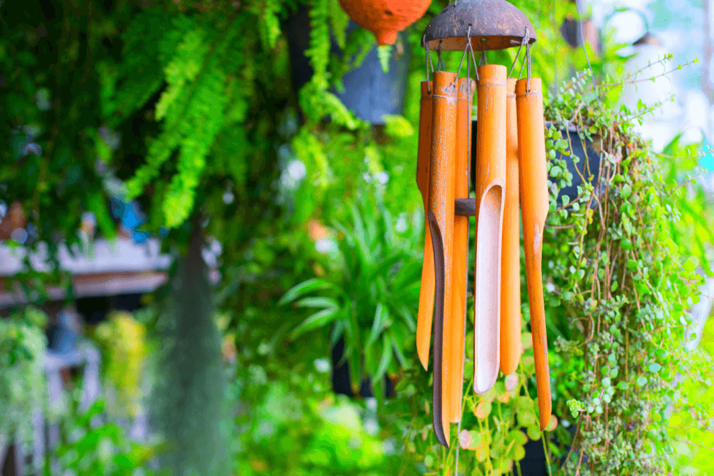 Japanese bamboo wind chimes near a tree.