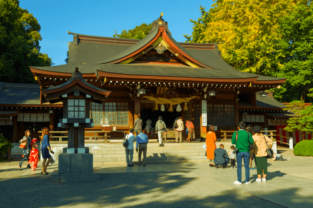 People praying at Izumi Shrine.