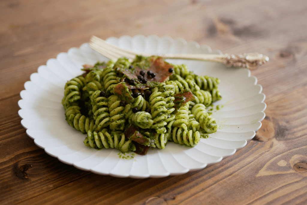 A plate of shiso seasoning with genovese pasta.