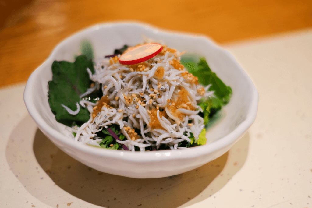 What is shiso with whitebait? It's a bowl of perilla leaves with small white fish.