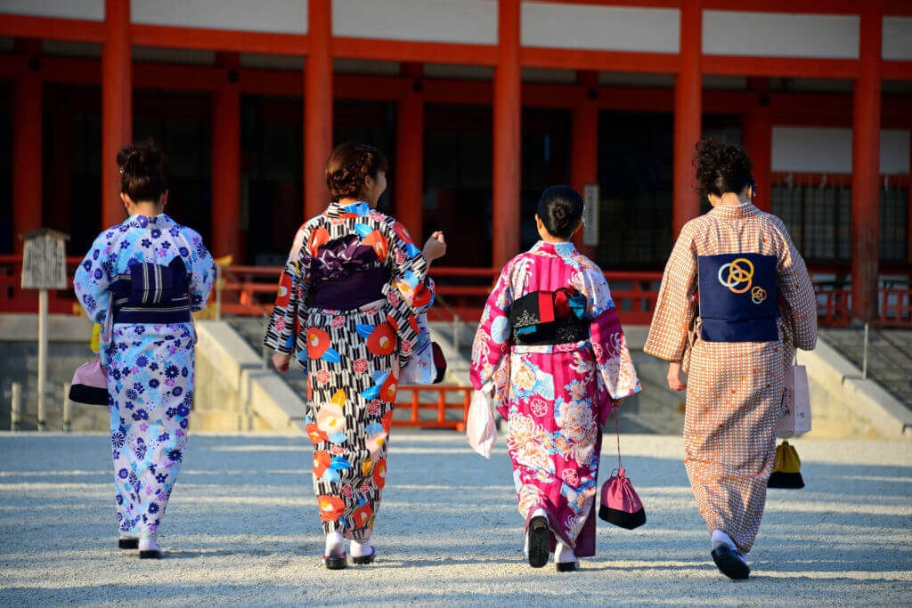 four young women in traditional kimono in Heian Shrine