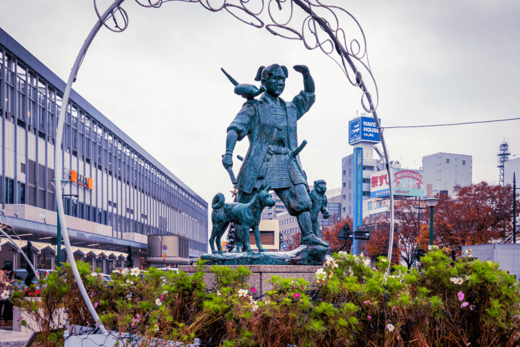 A statue of Momotaro in Okayama.