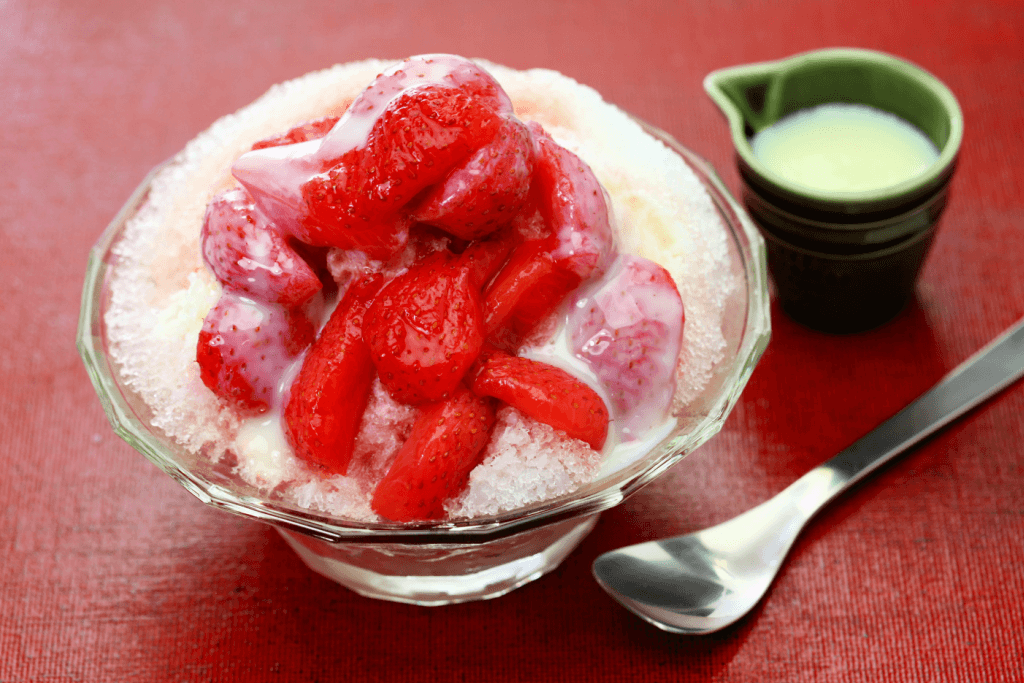 Kakigori with condensed milk and strawberries.