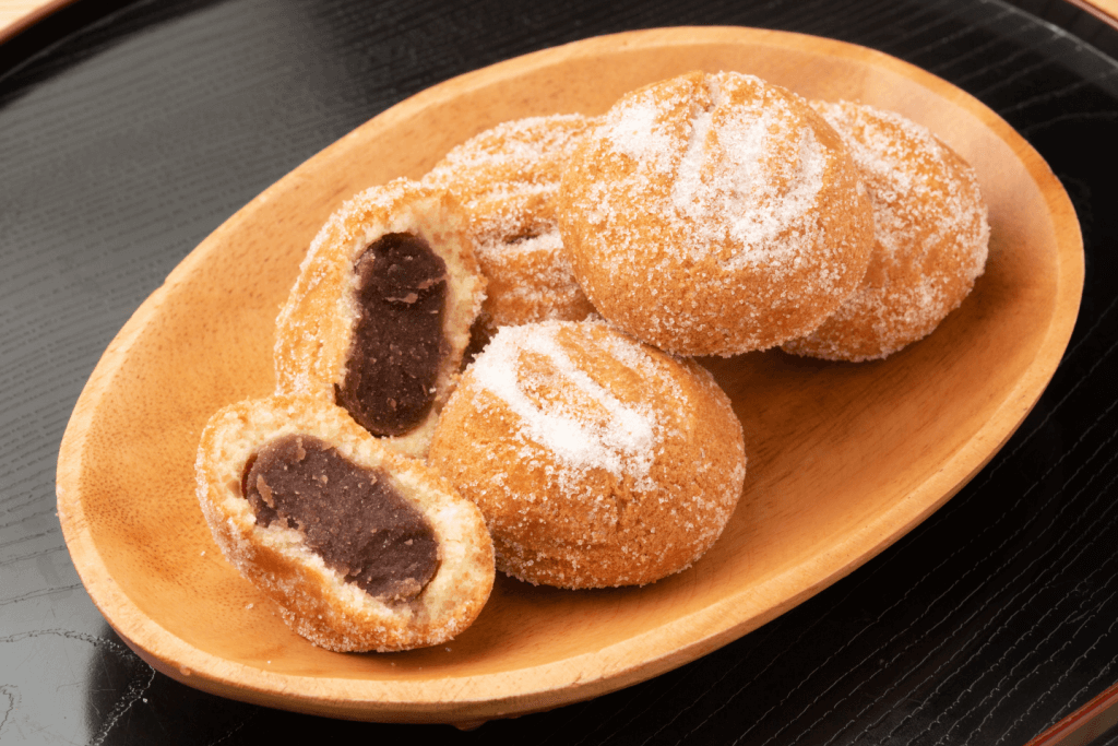 A plate of anko red bean paste donuts.