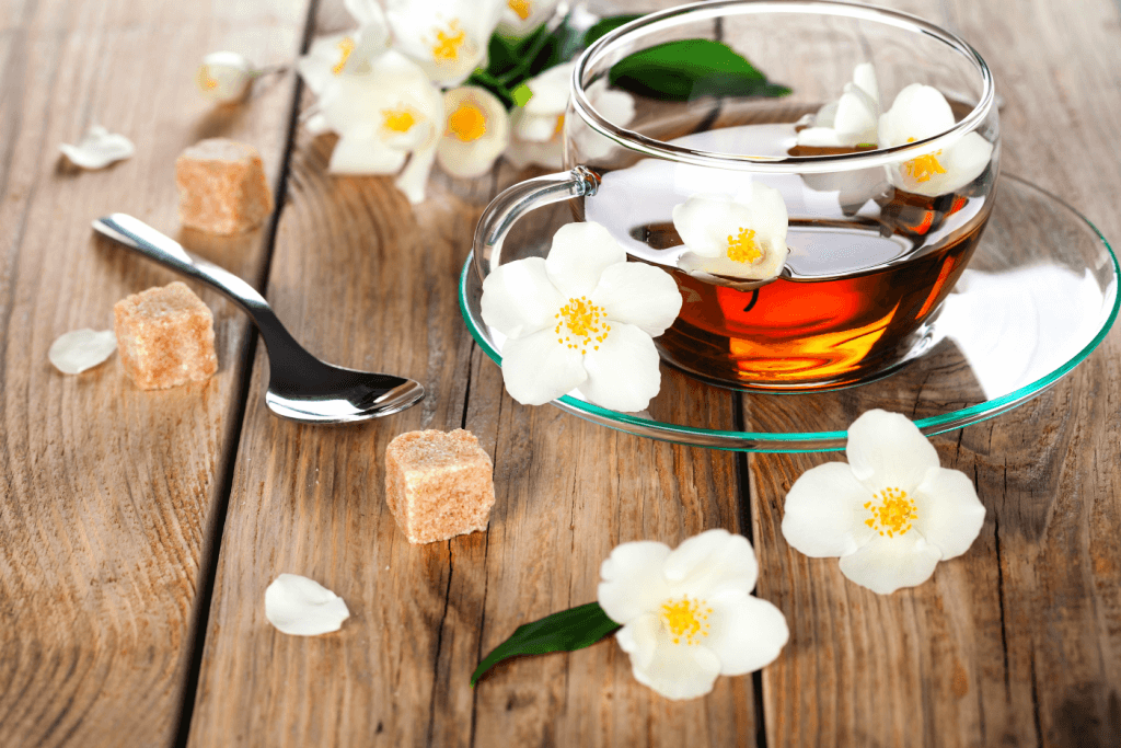 Jasmine tea with flowers and brown sugar.