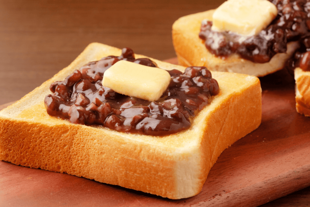 Two slices of Ogura toast (thick toast with red bean paste and butter on top).