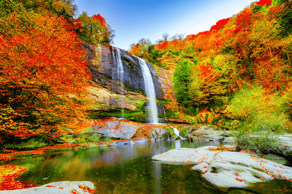 A waterfall during autumn in Japan.