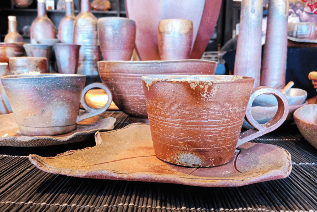 A bunch of Bizen pottery on display. 