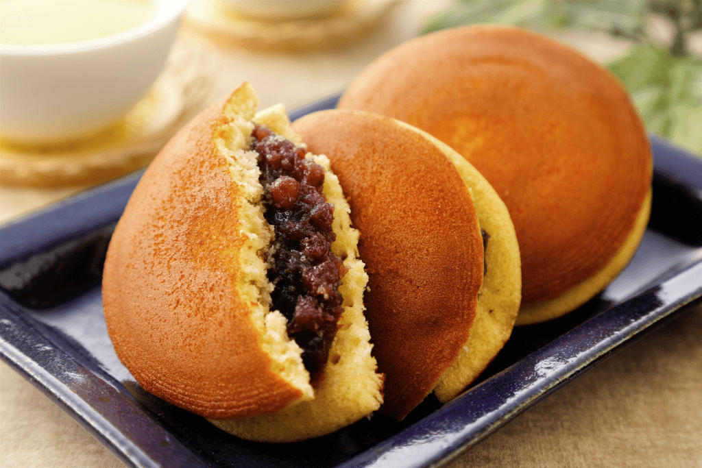 A plate of dorayaki pancakes with an azuki bean filling.