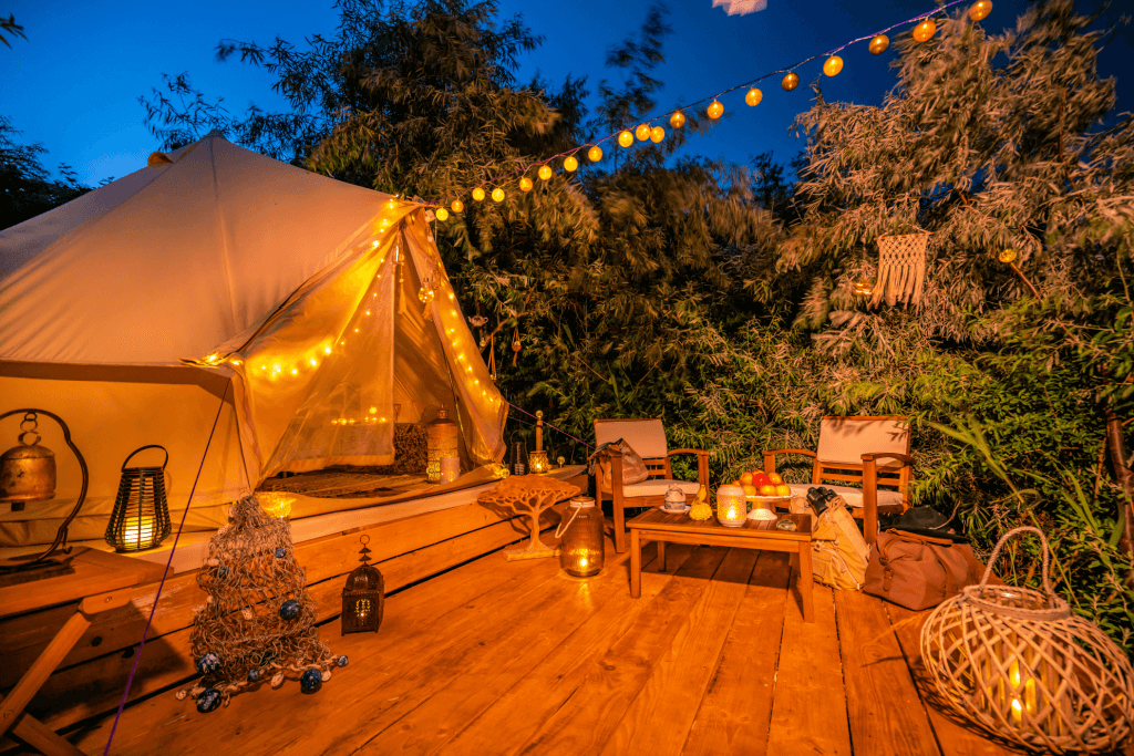 A luxurious tent at a camp that exemplifies what is glamping.