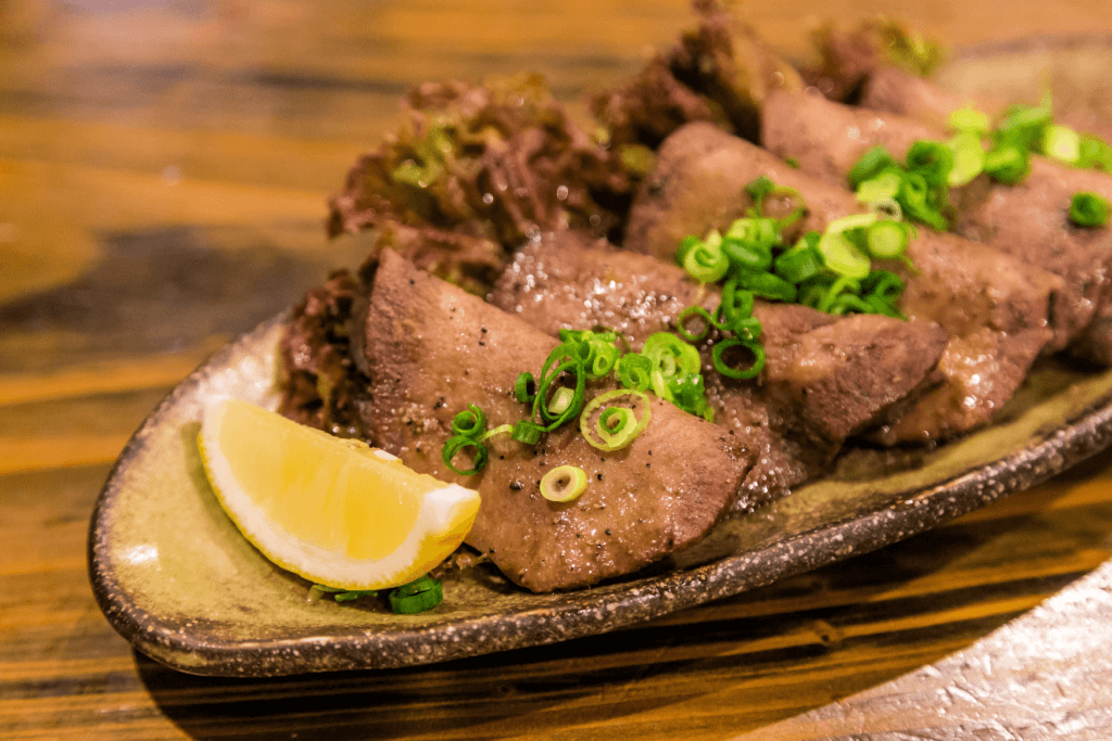 A plate of beef tongue, which sometimes goes with sansho pepper.