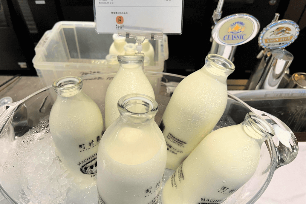 Bottles of Hokkaido milk in a store.