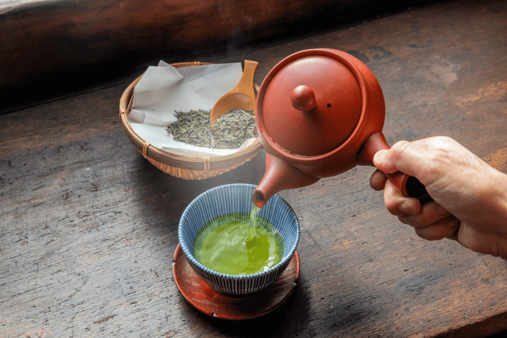 Someone using a Japanese tea set for the seasonal holidays.