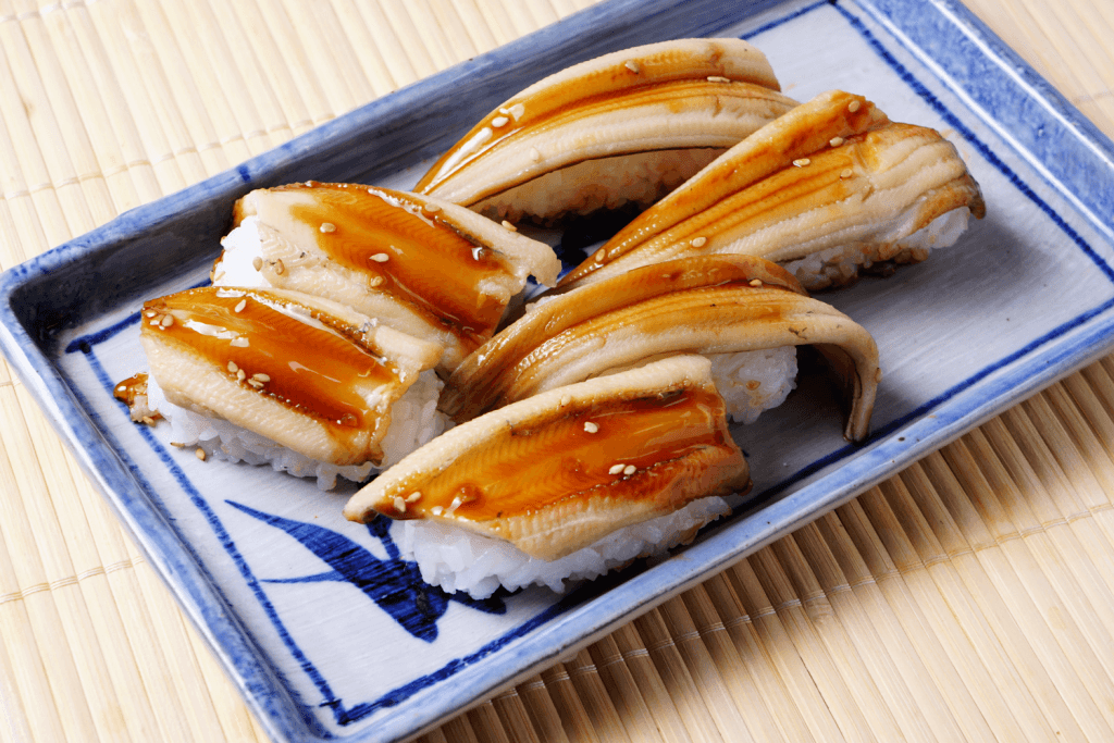 A plate of anago sushi.