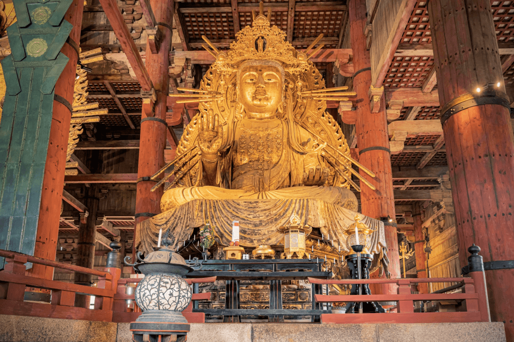 A golden Buddha statue in a temple.