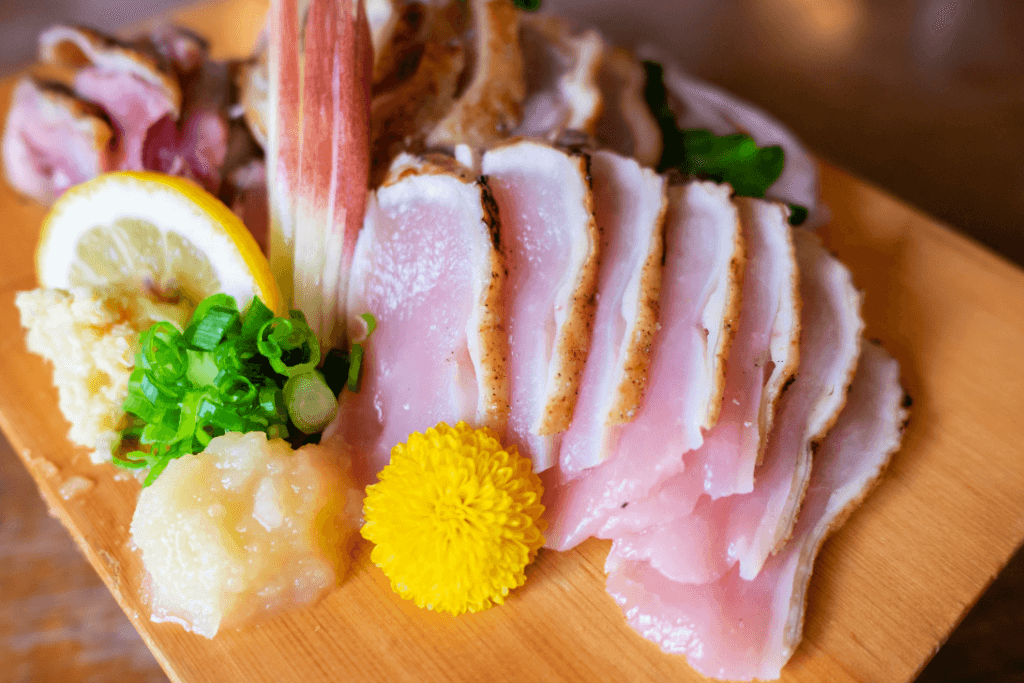 A plate of torisashi, or chicken sashimi, a Kagoshima delicacy.