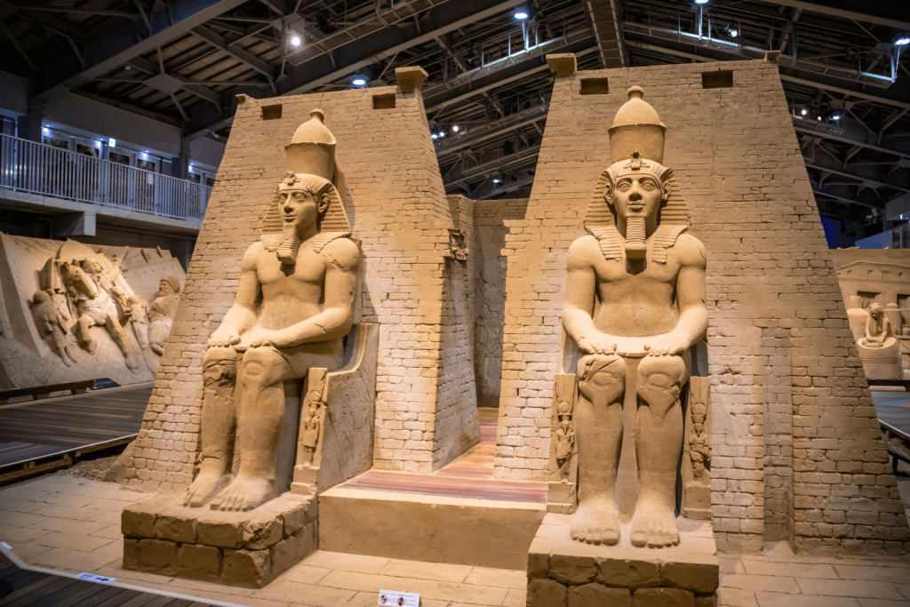 Sculptures from Tottori Sand Museum that resemble ancient Egyptian statues.