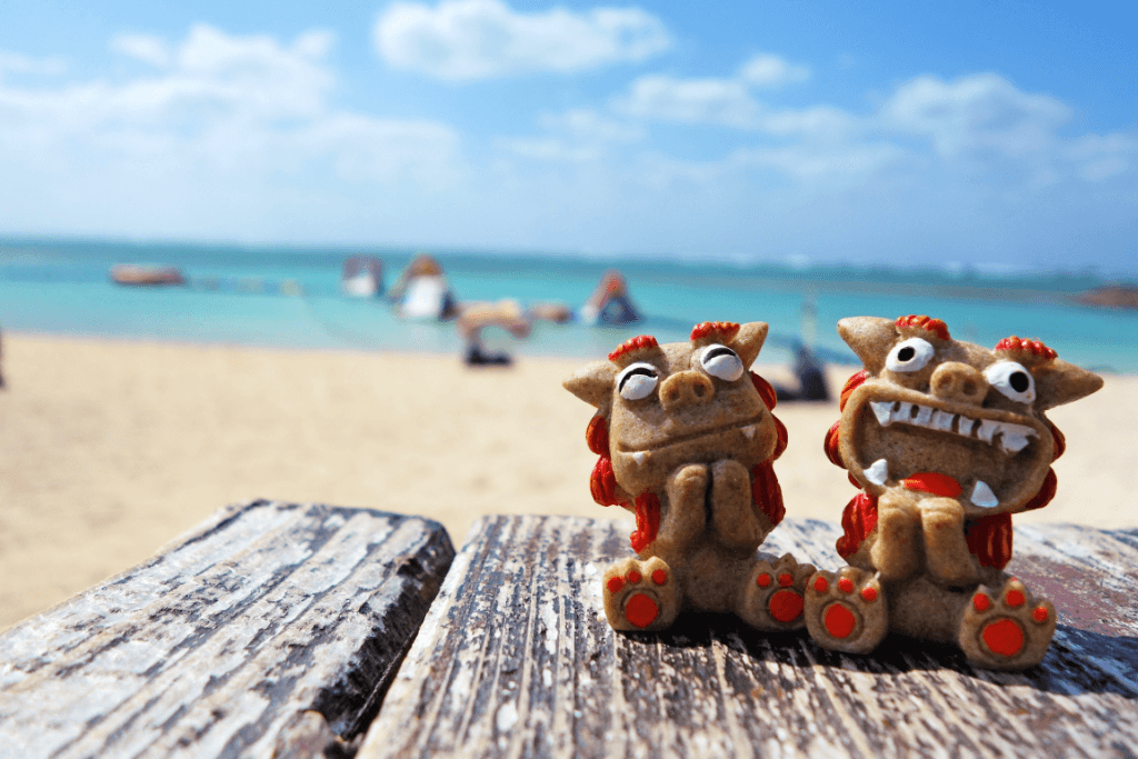Two Shisa lion guardian statues on an Okinawa beach. This is perfect an Okinawa time.