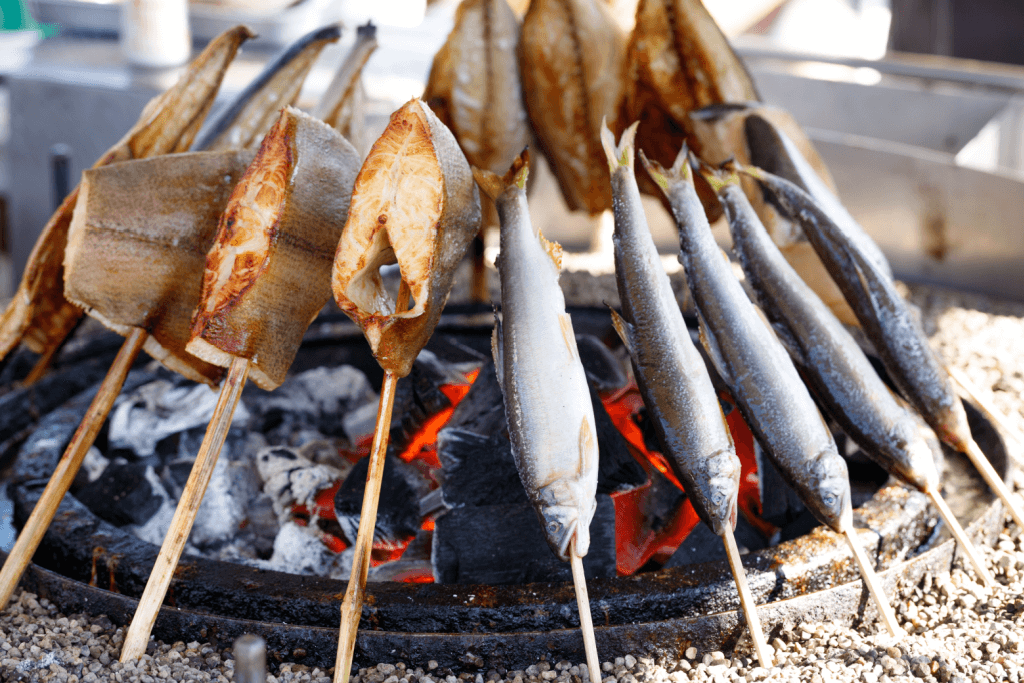Grilled fish around a robatayaki.