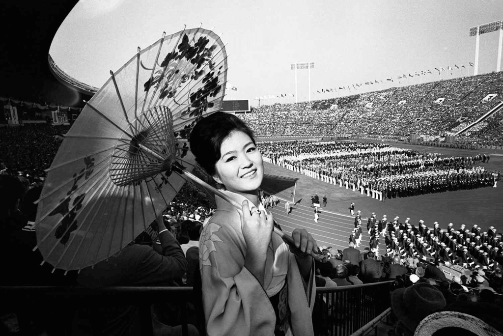 A woman in a kimono at the 1964 Tokyo Olympics.