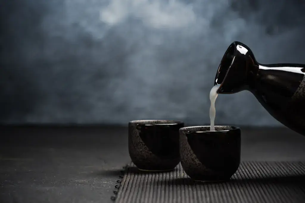 Black ochoko cups and saku bottle.