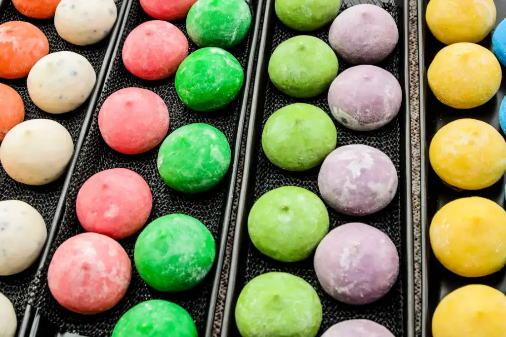 A bunch of colorful mochi.
