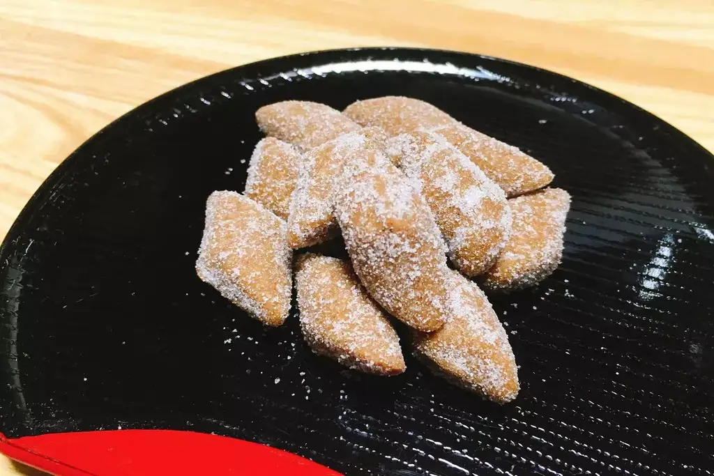 A plate of a type of Japanese soft candy called genkotsu-ame.